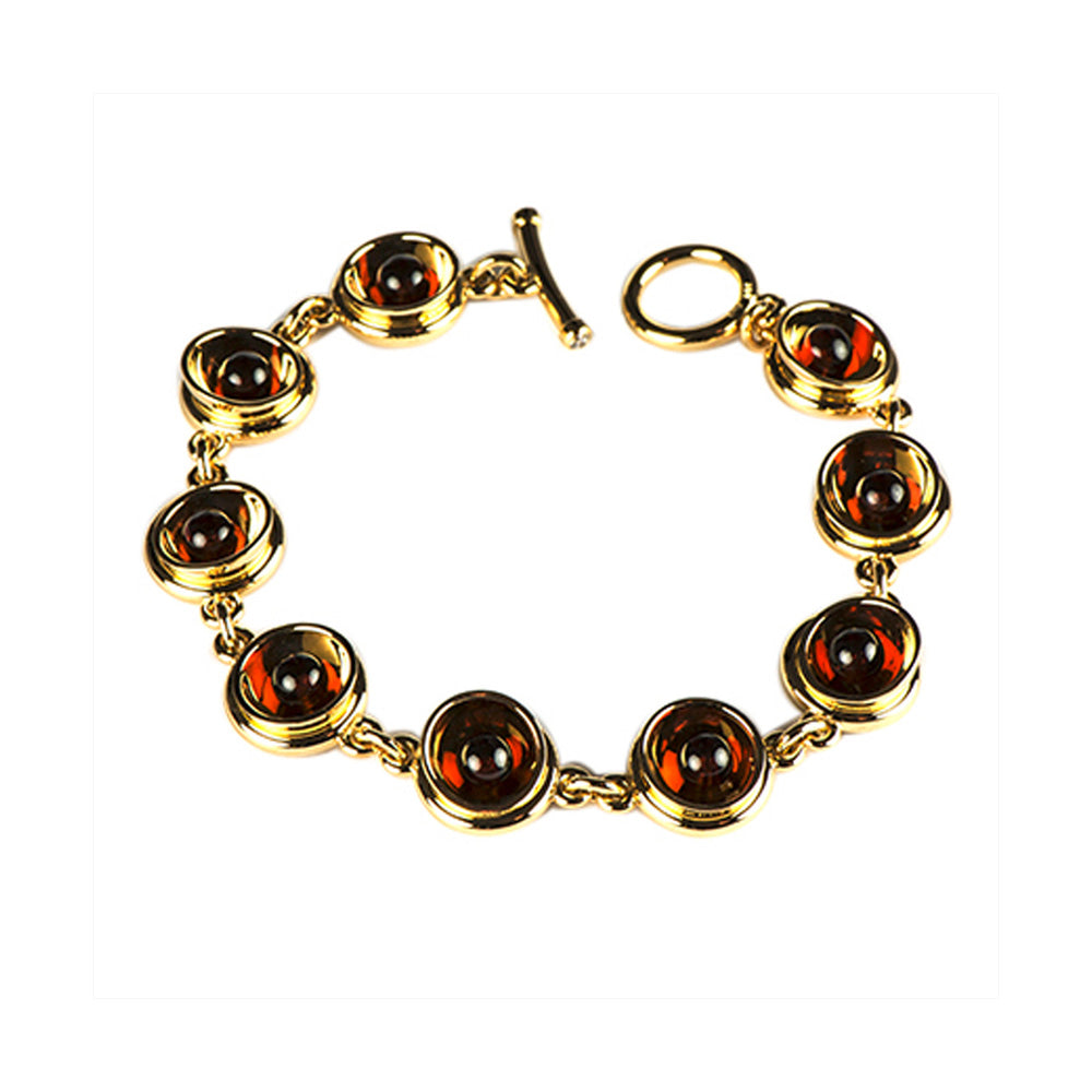 Armschmuck Granatkugeln aus Gelbgold mit Granat und Brillant
