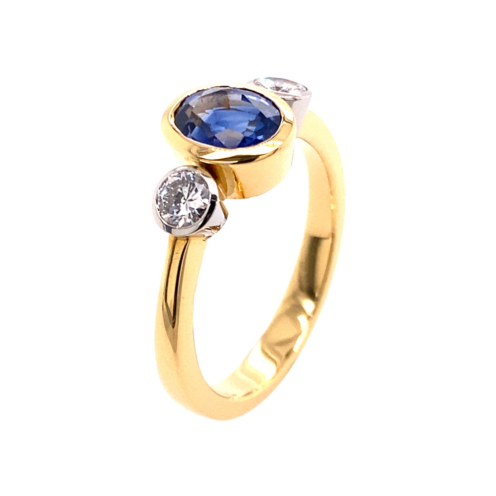 Ring Tres aus Gelbgold und Platin mit Saphir und Diamant
